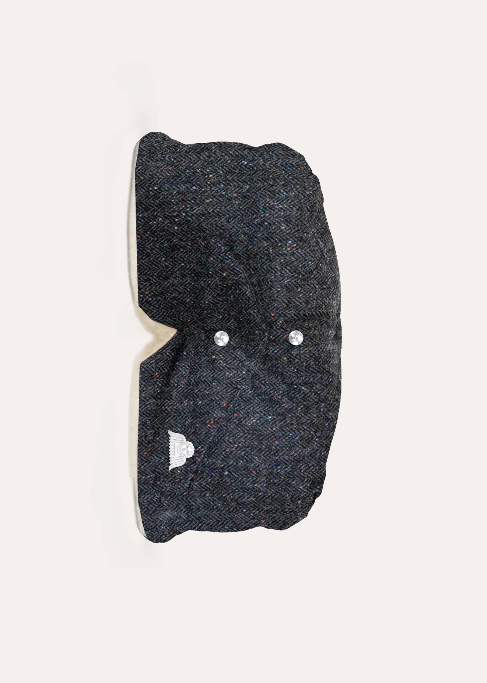 Handmuff aus dunkelgrauem Harris Tweed mit Fischgrätmuster, buntem Noppengarn und heller Innenseite
